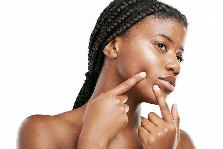 Woman checking her skin